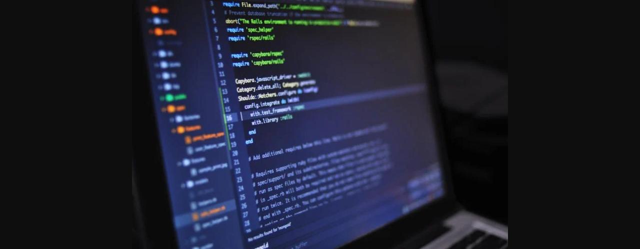 Extreme close-up of computer code displaying various programming terms and elements.